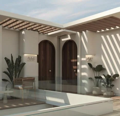 Room entrances beneath the pergola